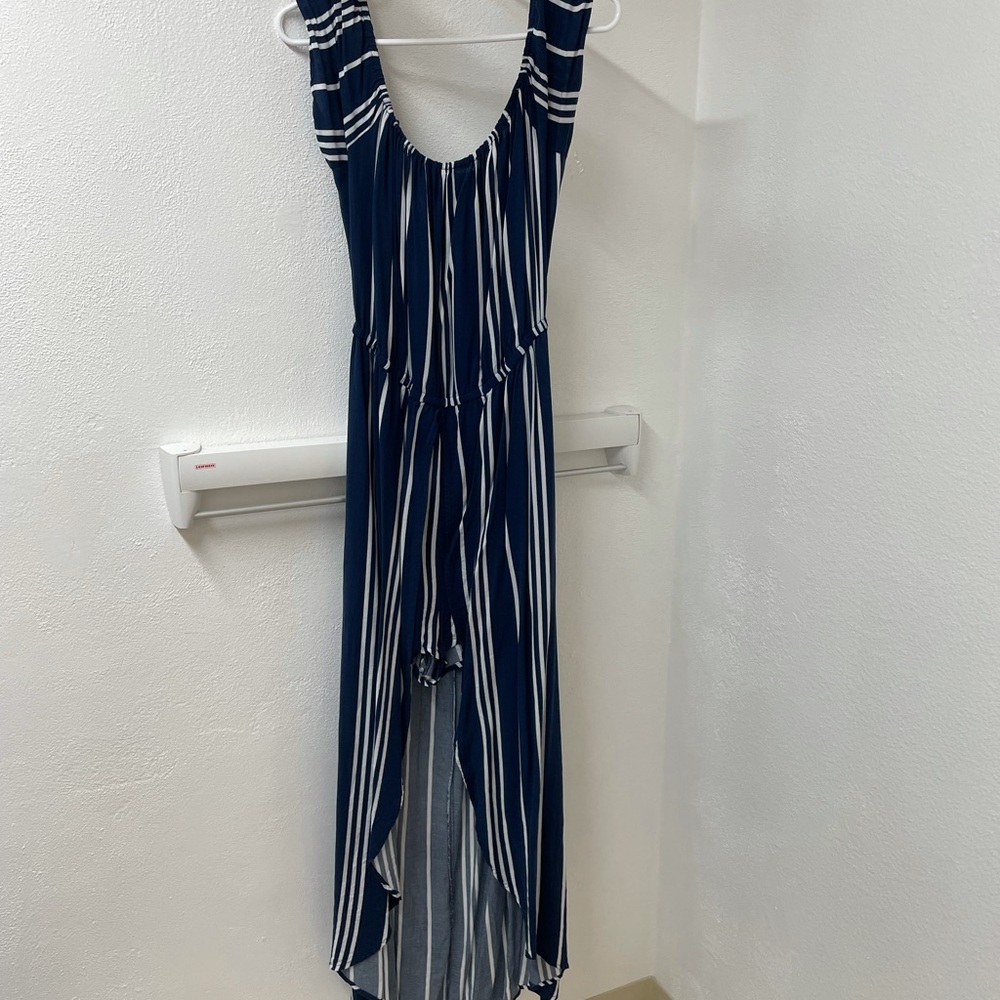 Women’s flyaway romper w/ skirt/ shorts built in.